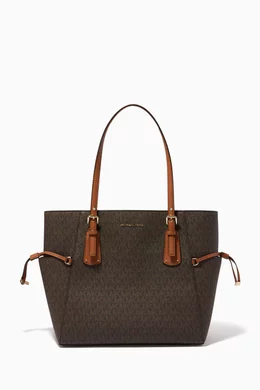 Michael kors east west voyager store tote