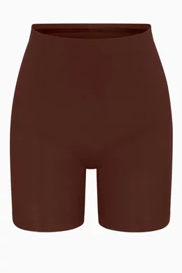 Buy SKIMS Brown Seamless Sculpt Mid-thigh Shorts for Women in
