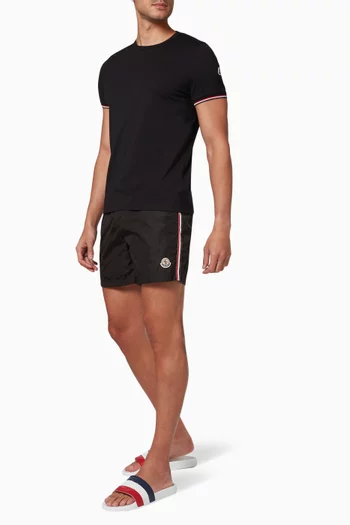 شورت سباحة بشعار الماركة