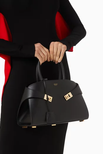 Small Hug Top Handle Bag in leather