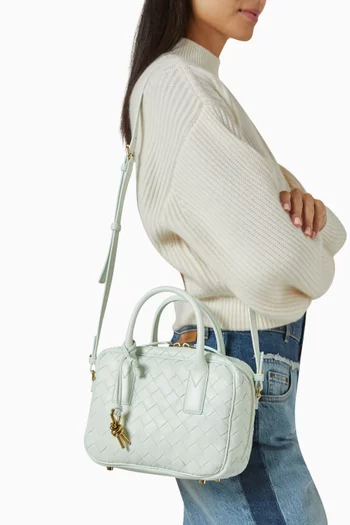 حقيبة جيت واي صغيرة بيد علوية جلد مجدول