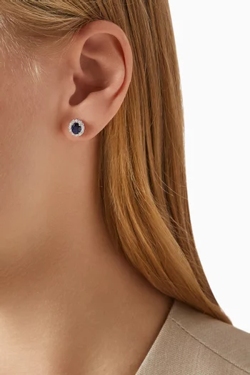 Oval Sapphire & Diamond Halo Earrings in 18kt White Gold