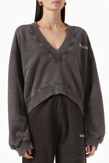 سويت شيرت فضفاض بفتحة رقبة V صوف ناعم