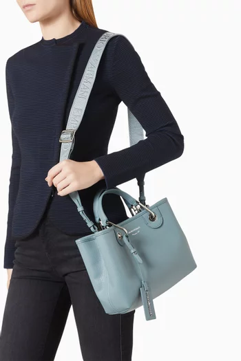 حقيبة يد صغيرة بشعار الماركة جلد صناعي