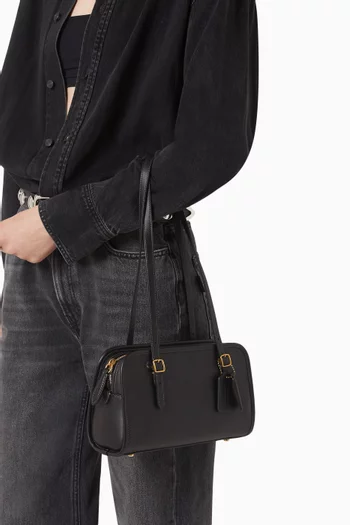 حقيبة يد سوينج بسحّاب جلد ناعم مدبوغ