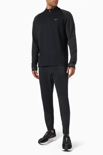 تي شيرت للجري بسحّاب قصير بتقنية Dri-FIT