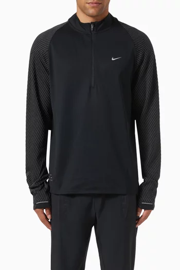 تي شيرت للجري بسحّاب قصير بتقنية Dri-FIT