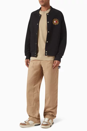 تي شيرت بشارة بشعار الماركة قطن