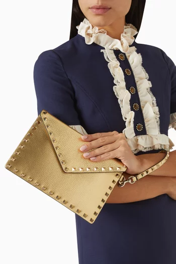 Rockstud Clutch in Laminated Calfskin