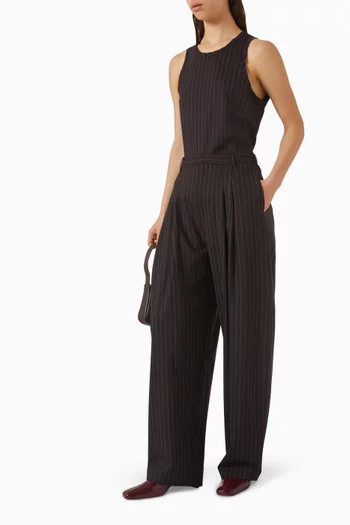 بنطال بقصة تضيق باتجاه الحافة ونقشة مخططة صوف