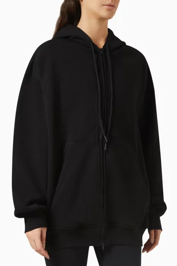 كنزة بغطاء رأس فضفاضة بسحّاب قطن