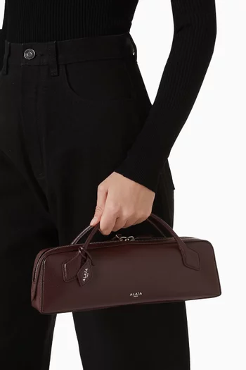 Le Teckel Clutch Bag in Leather