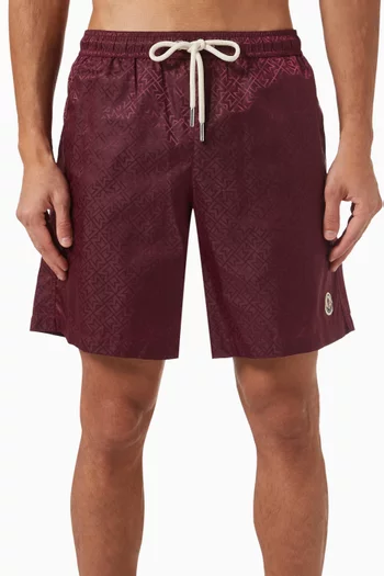 شورت سباحة برباط تضييق وشعار الماركة