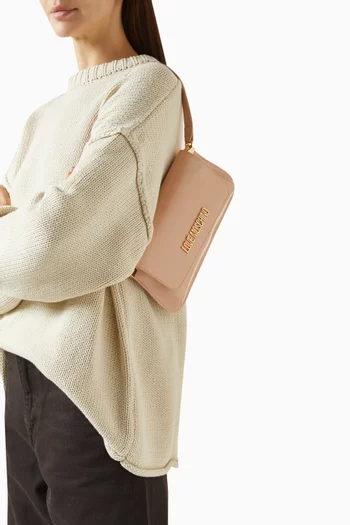 حقيبة كتف جلد صناعي بشعار الماركة