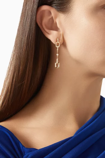 أقراط لينكس مرصعة بالماس ذهب أصفر عيار 18