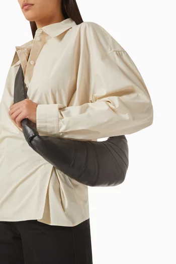 Small Croissant Crossbody Bag in Leather