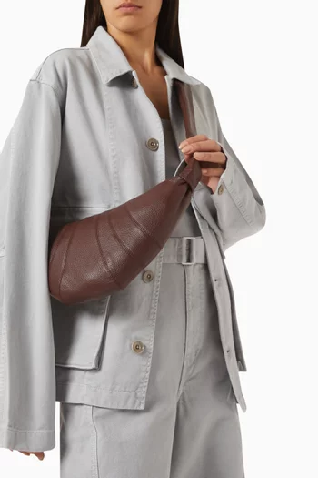 Small Croissant Crossbody Bag in Leather