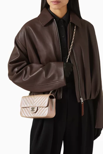 Quilted Flap-over Crossbody Bag in Leather