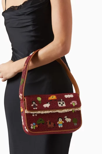 حقيبة كتف تومي مزينة بالخرز