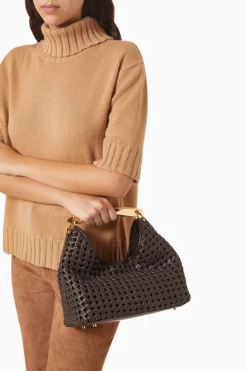 حقيبة بومرانج بتصميم مجدول جلد