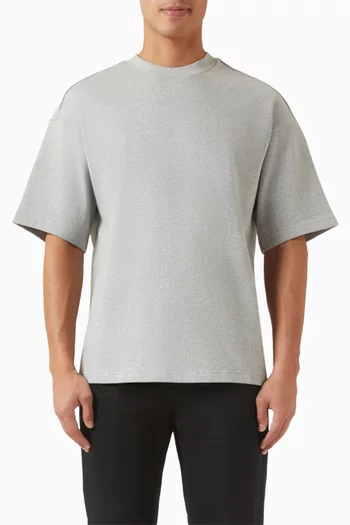 تي شيرت مزين بشعار الماركة قطن