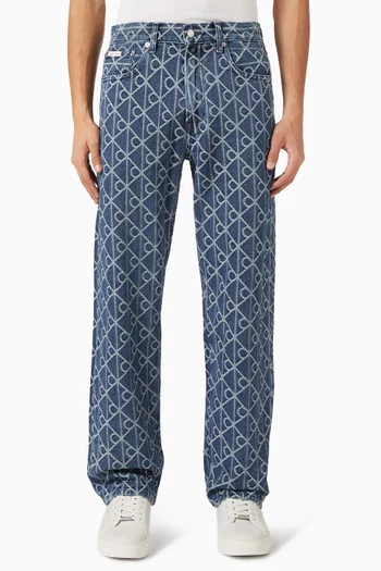 بنطال جينز بقصة مستقيمة من التسعينيات ونقشة شعار الماركة بالكامل دينم