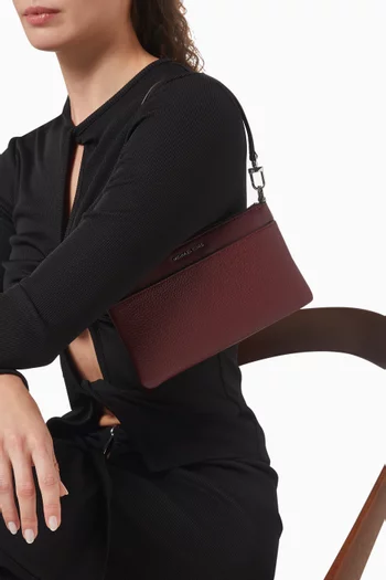 حقيبة جت ست متوسطة بحمالة معصم جلد