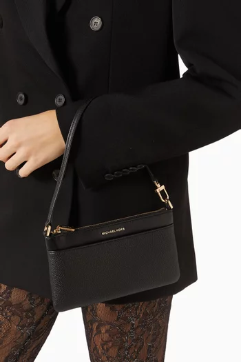 حقيبة جت ست متوسطة بحمالة معصم جلد