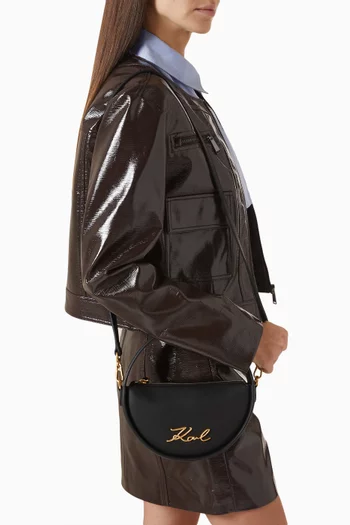 حقيبة كيه/سجنتشر بتصميم دائري جلد صناعي