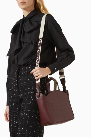 حقيبة يد كيه/سيركل صغيرة بتصميم مثقوب جلد