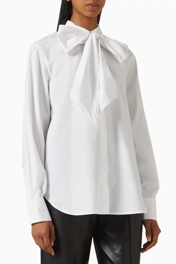 بلوزة ريترو بعقدة قطن عضوي