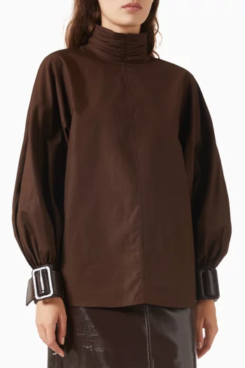 بلوزة بأكمام منفوخة