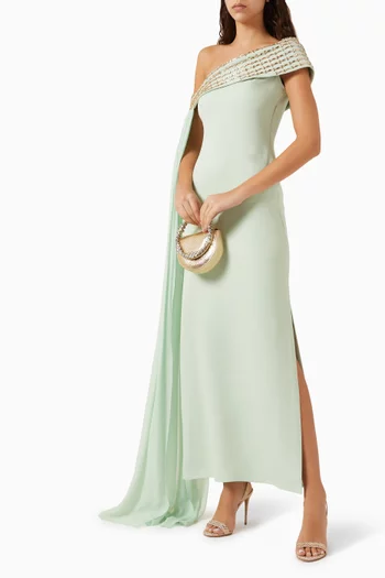 فستان طويل بكتف مكشوف وتطريزات