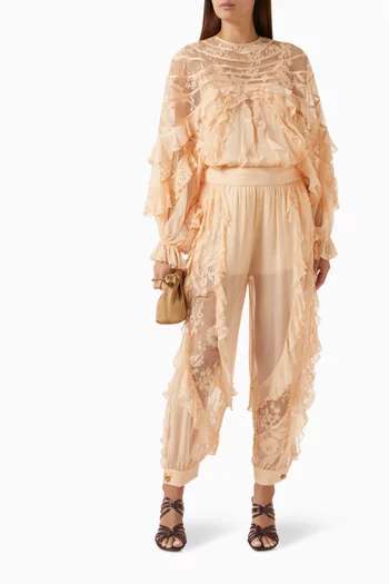 بلوزة ربيلين بقصة واسعة ومقسمة لأجزاء حرير