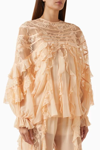 بلوزة ربيلين بقصة واسعة ومقسمة لأجزاء حرير