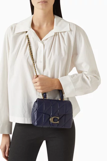 حقيبة تابي بيد علوية جلد مبطن