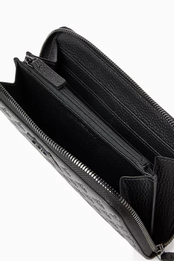 محفظة بسحّاب وشعار النسر المحفور جلد