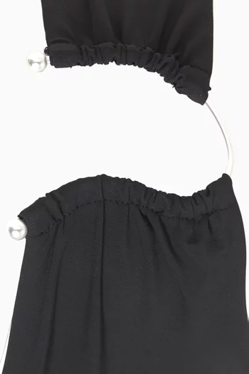 قطعة بيكيني سفلية بكشكش جانبي وحلية معدنية نصف دائرية