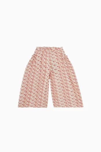 بنطال بقصة ساق واسعة ونقشة شعار النسر