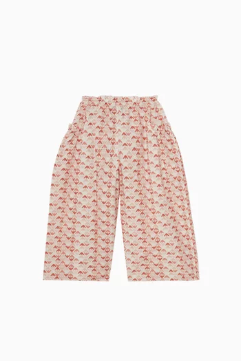 بنطال بقصة ساق واسعة ونقشة شعار النسر