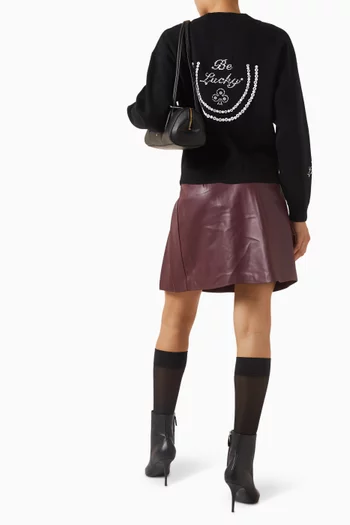 كارديغان بعبارة Lucky مطرزة باللؤلؤ