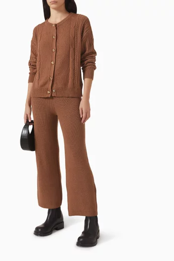 سترة بأزرار منسوجة بغرزة الضفيرة