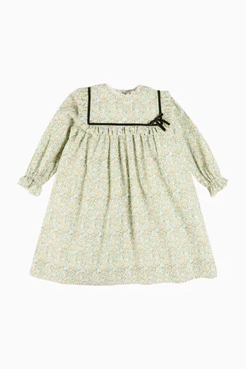 فستان أديلايد بتصميم ترابيز ونقشة زهور