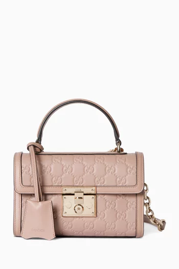 حقيبة صغيرة بيد علوية وقفل جلد بشعار حرفي GG