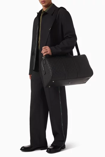 حقيبة دفل متوسطة بشعار حرفي GG جلد