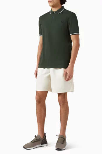 تي شيرت بولو قطن مزين بخطين