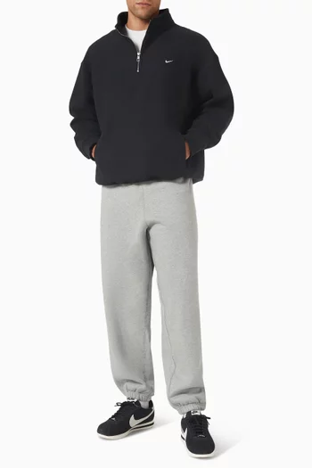 سويت شيرت بسحّاب قصير وشعار سولو صوف