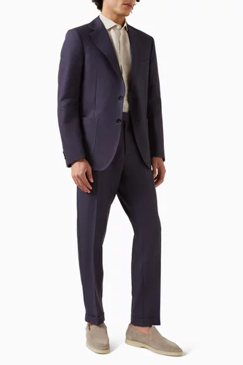 بنطال أنيق بقصة تضيق باتجاه الحافة كتان