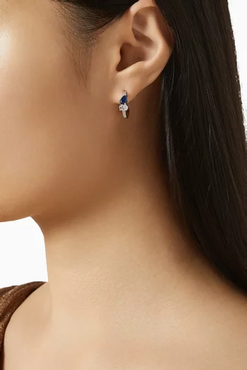 أقراط دائرية مرصعة بأحجار بيضاوية وكمثرية نحاس مطلي روديوم