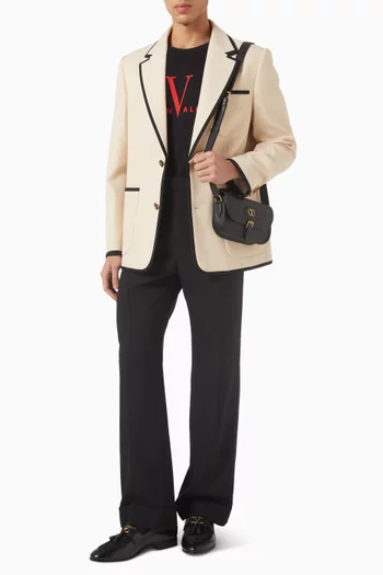 جاكيت بصف أزرار صوف غابردين